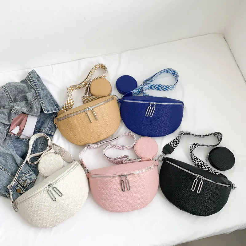 Solid colour women's crossbody bag with horizontal square clamshell design and zip closure