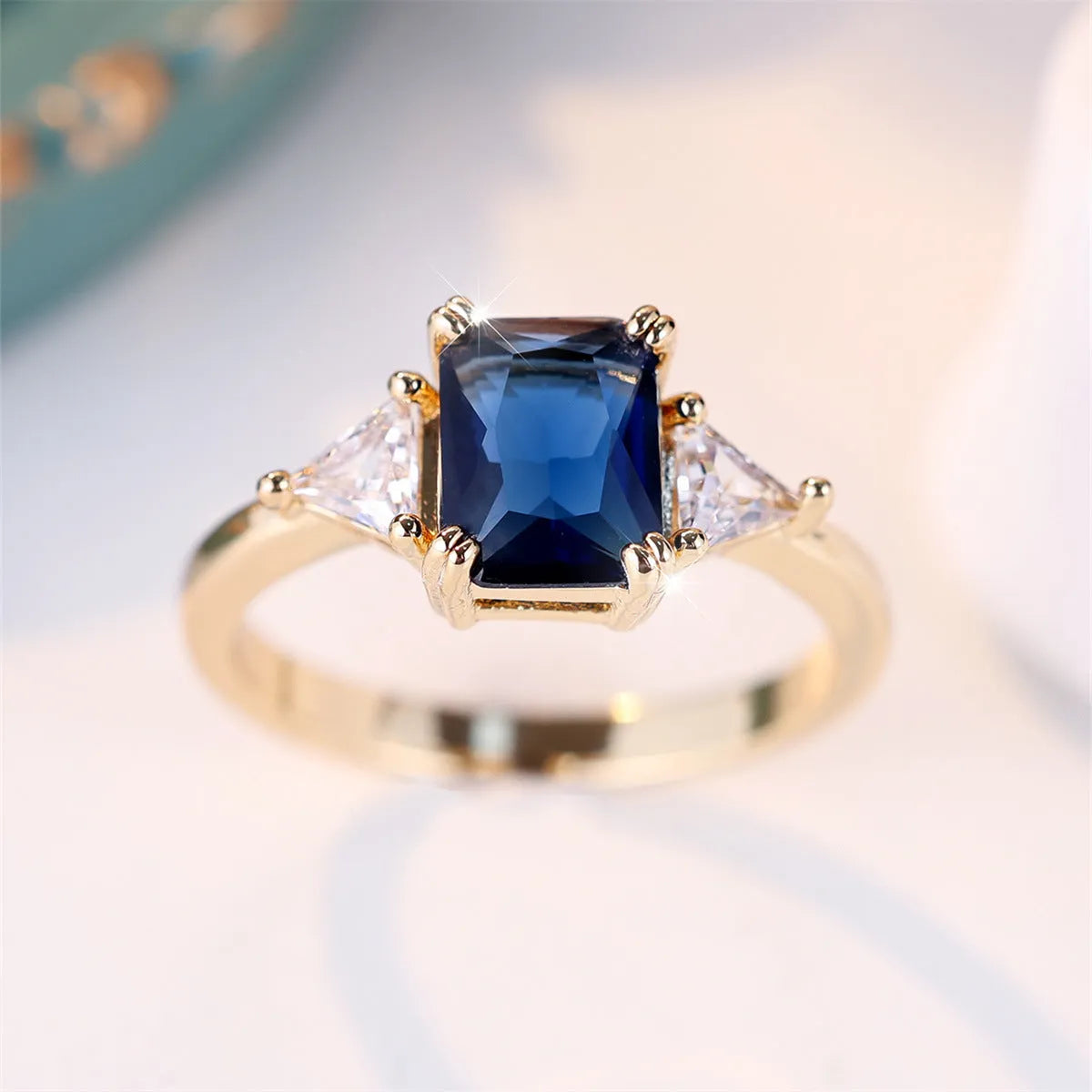 Rectangular gold sapphire blue copper ring for women with geometric design