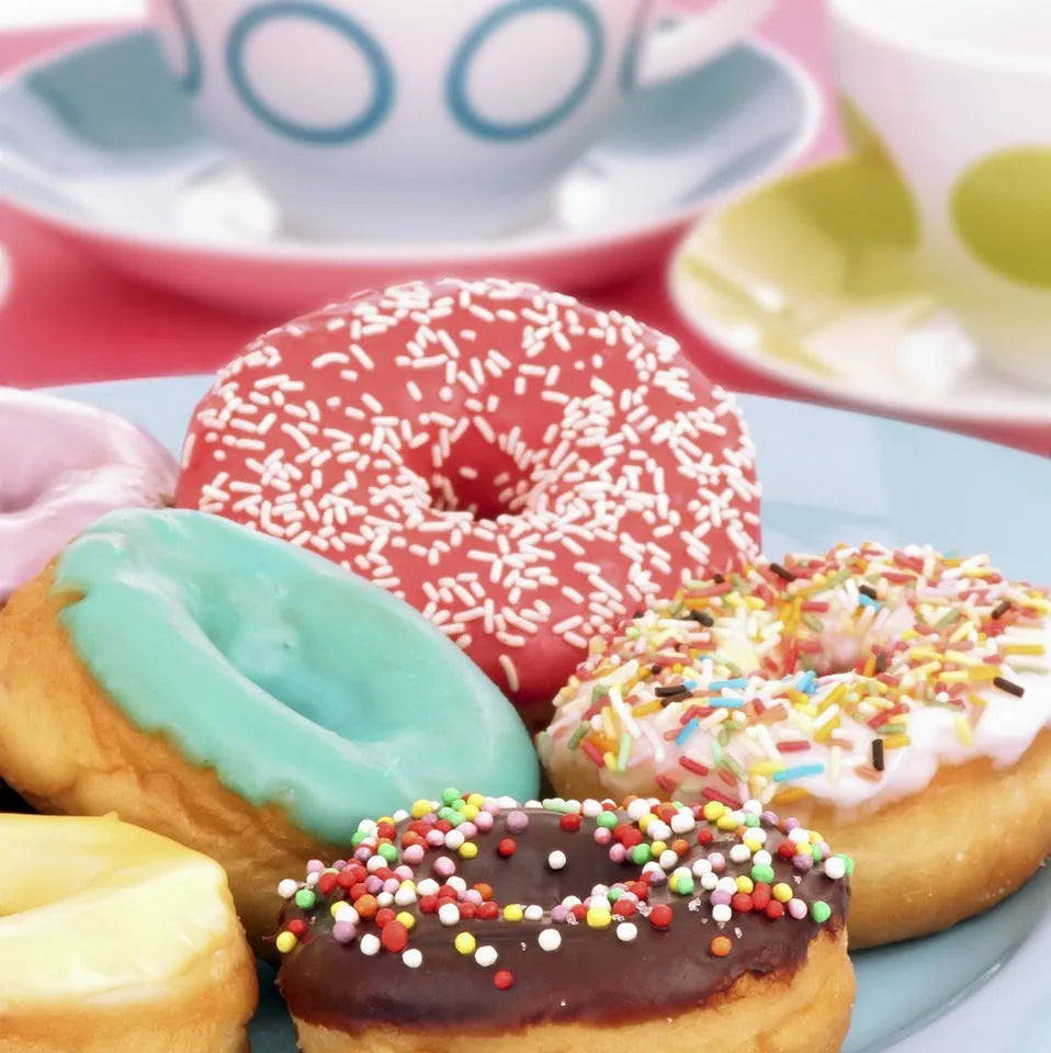 White home donut maker with 23cm caliber and mechanical control on a countertop