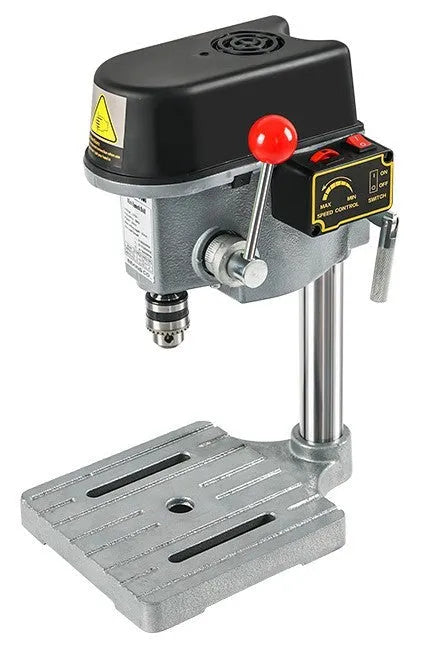 Mini bench drill and milling machine with 1050W drill and bench pliers on a workbench.