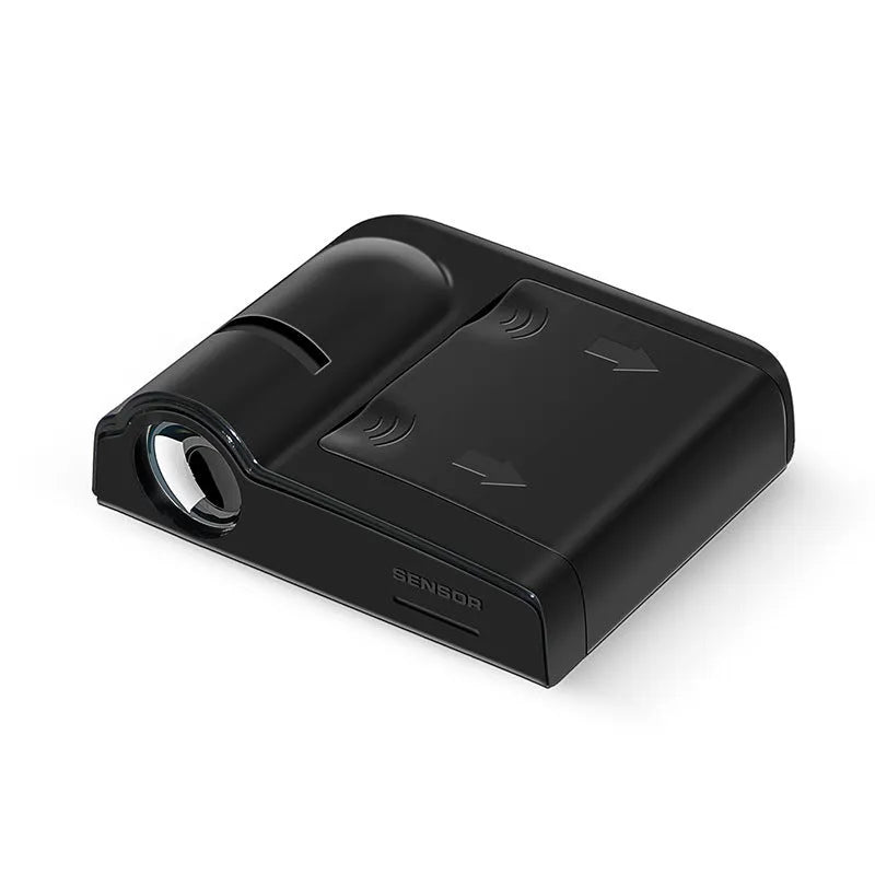 Compact black or beige ABS plastic car decorative projection radium lamp with battery compartment.