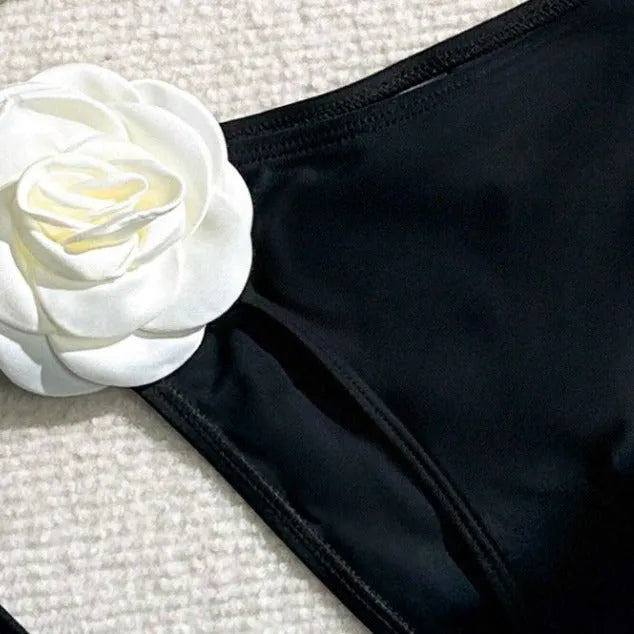 Black 3D flower drawstring lace split bikini set on a mannequin.