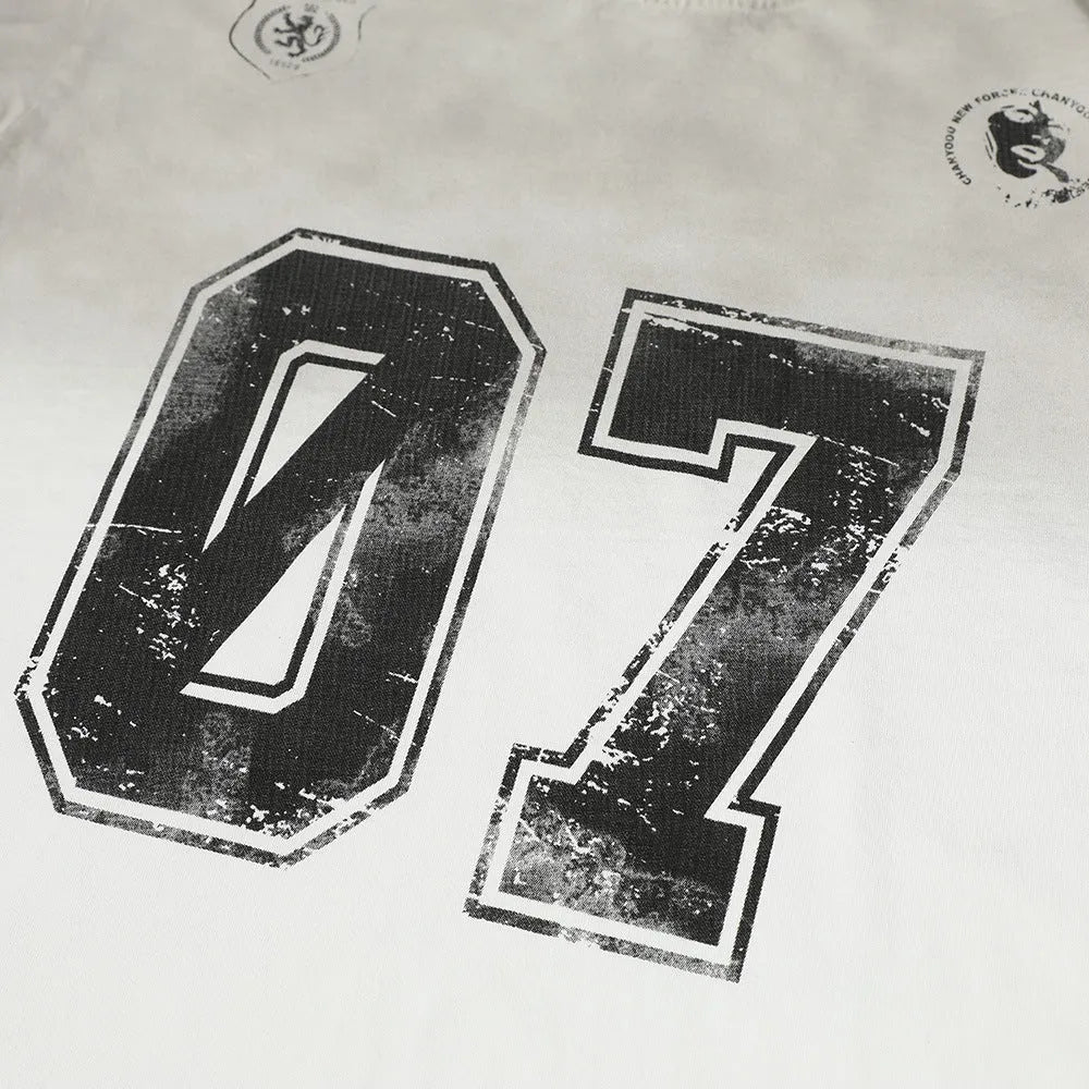 Men's black and white pure cotton printed short-sleeve t-shirt showing Asian size label.