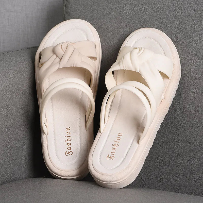 Women's black PVC outdoor sandals showing soft back thick back construction and two-way wear design