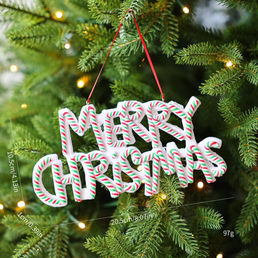 Merry Christmas letter plate polymer clay ornament in red and white hanging on Christmas tree branch