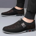Men's grey and white synthetic leather casual shoes with square toe and flat rubber sole.