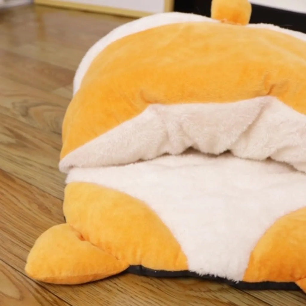 Orange fleece cat sleeping bag with semi-closed nest design, measuring 65cm long