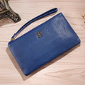 Long 55-inch PU leather zip wallet handbag in a solid colour with sewing line detail.