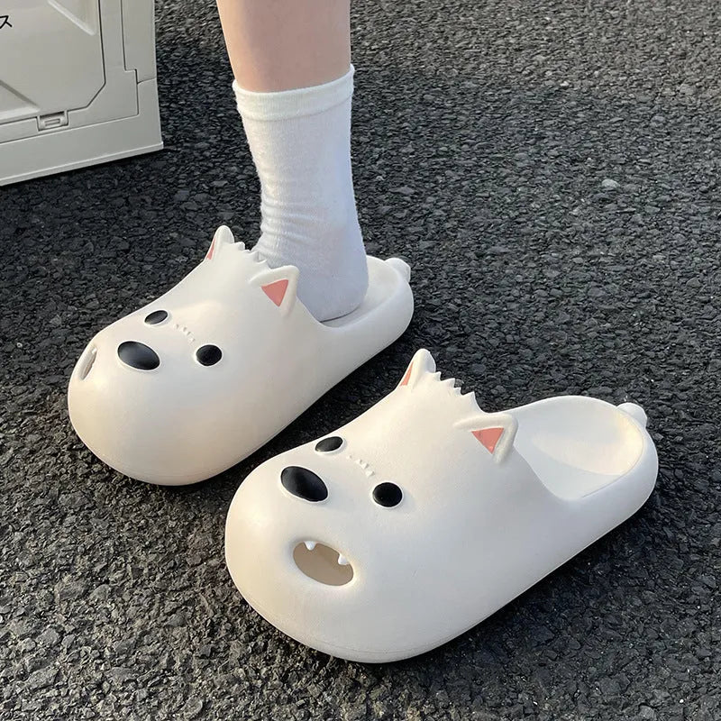 Women's black EVA toe-cap slipper sandals on a white background, showing moulded sole and open-back design.