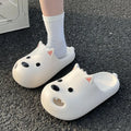 Women's black EVA toe-cap slipper sandals on a white background, showing moulded sole and open-back design.