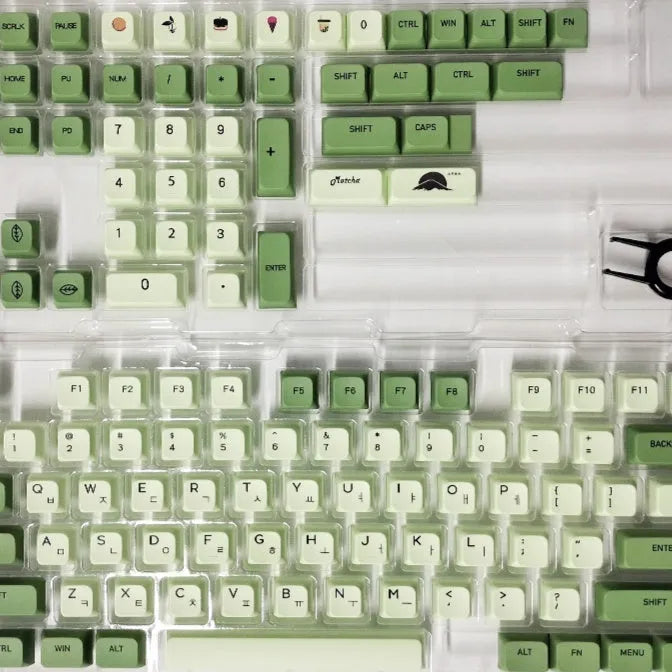 Set of 124 matcha green PBT keycaps with white legends for a mechanical keyboard
