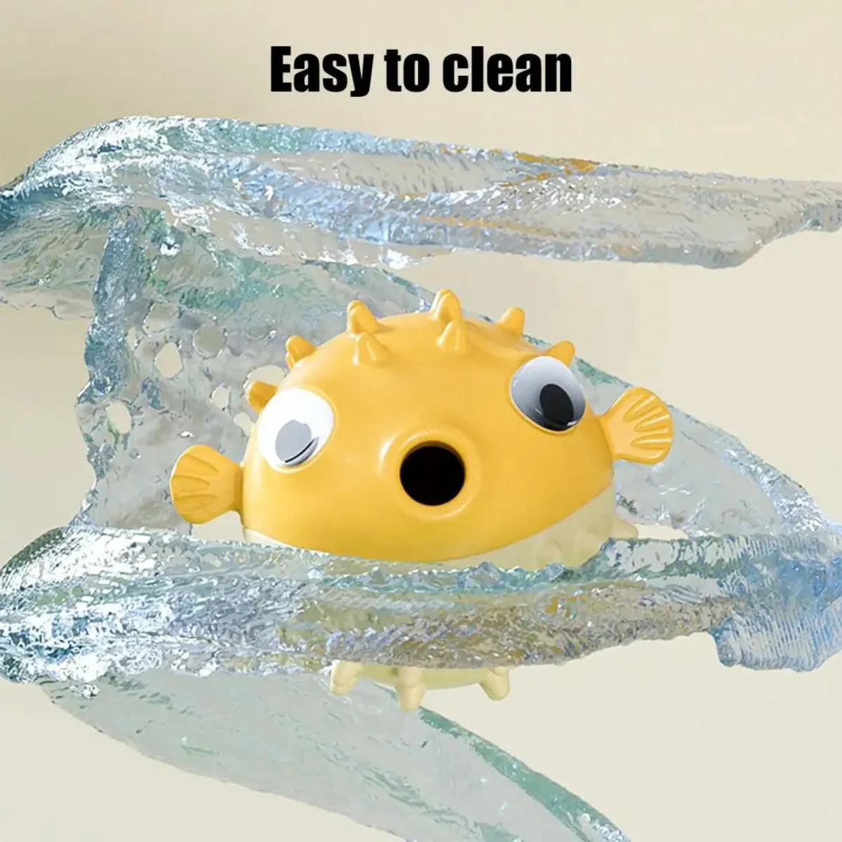 Yellow vinyl fish-shaped dog chew toy with textured surface for teeth cleaning.