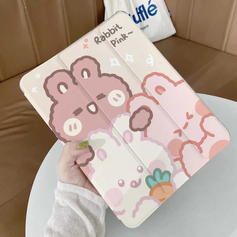 Rabbit cartoon design on a grey silicone iPad case shown folded into a stand position.