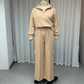Women's light camel polyester two-piece work set with lapel top and wide-leg trousers on hanger