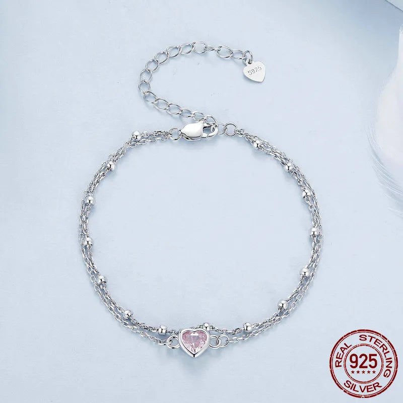 Sweet girlish 925 sterling silver bracelet with heart-shaped pendant on adjustable chain
