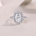 Camellia moissanite wedding ring set with egg-shaped 8x10mm stone, platinum-plated S925 silver band, gift box packaging