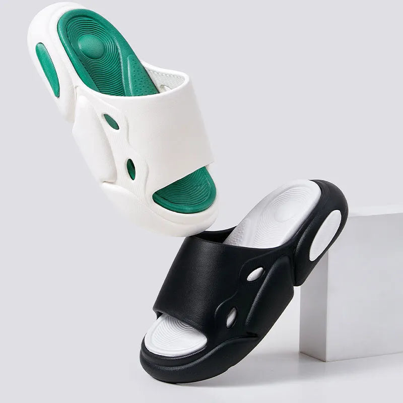 Two-colour EVA slippers showing black and white design with thick sole and leather lining