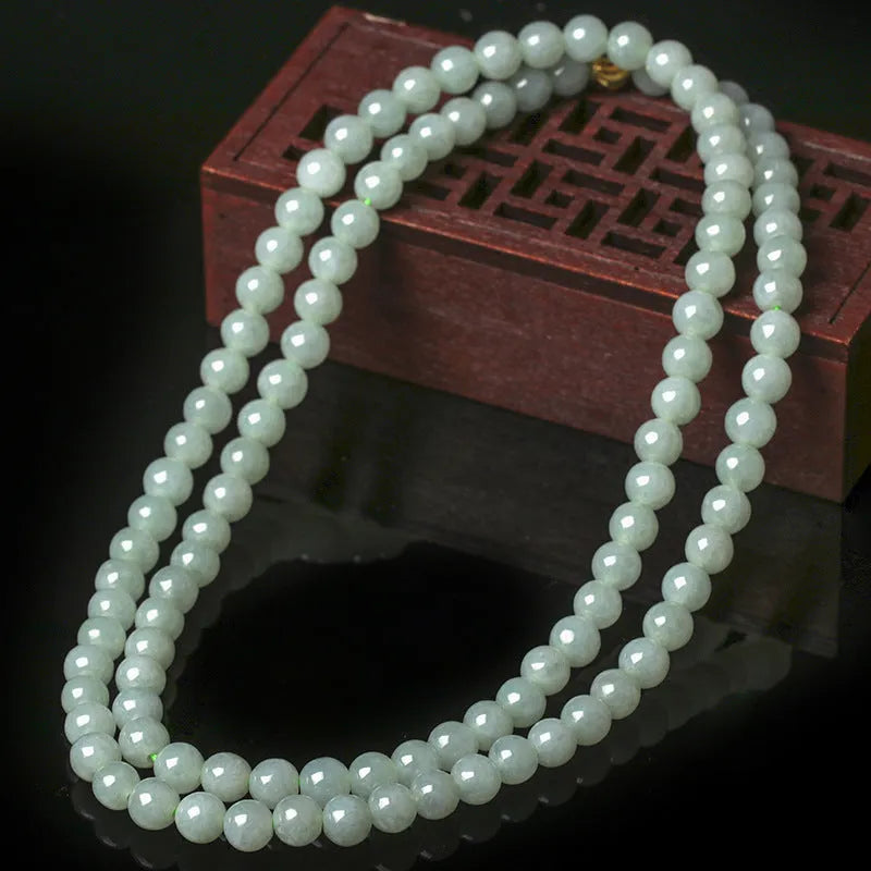 Natural jade bead necklace with white-green round beads on adjustable chain