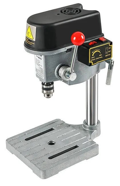 Mini bench drill and milling machine with 1050W drill and bench pliers on a workbench.