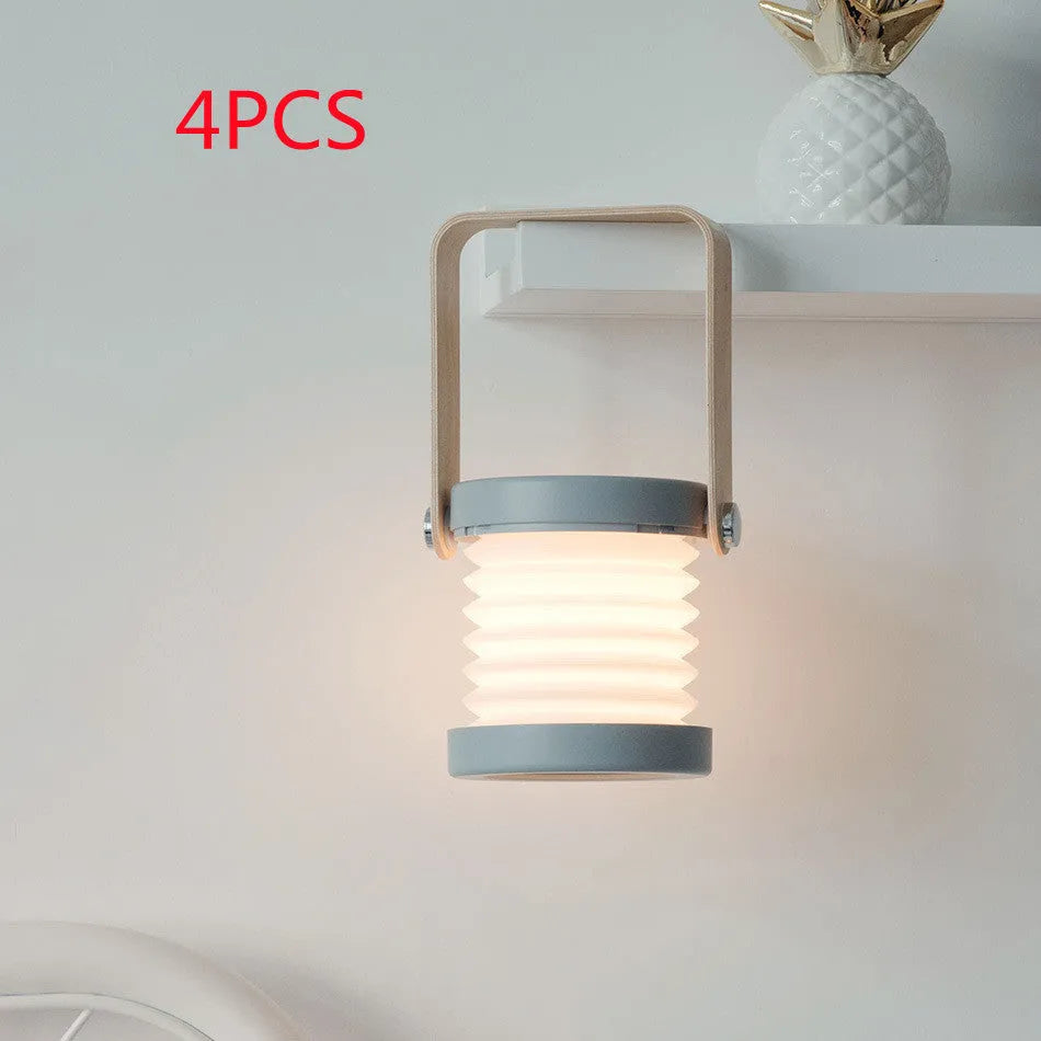 White foldable USB rechargeable LED lamp showing table lamp and lantern modes with touch dimmer.