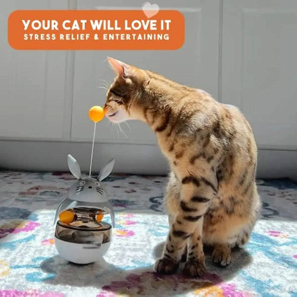 Interactive cat feeder toy treat dispenser with sounding bell in Brown Gray Pink White colours