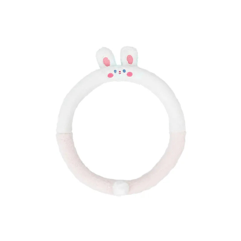 Plush rabbit fur car steering wheel cover with embroidered animal design, shown fitted on a 38cm wheel.