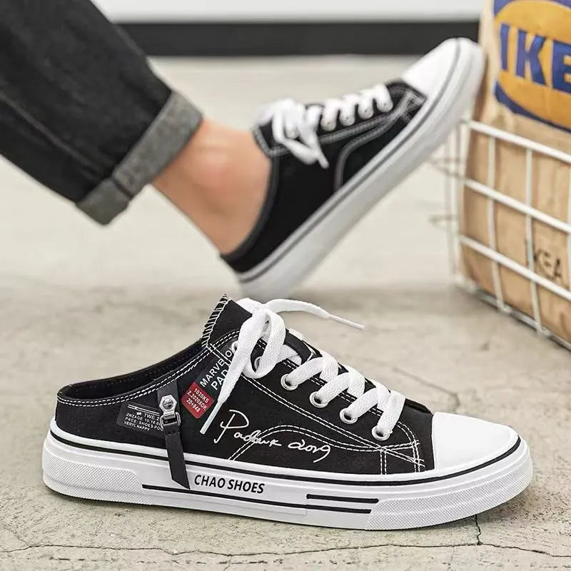 Men's canvas slip-on casual shoes in black or blue with round toe and PVC soles