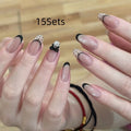 Pink artificial false nails with sweet girl illustrations, sold in sets of 5, 10, or 15.