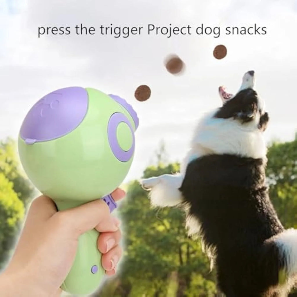 Green, orange, and pink interactive dog treat launcher toy with food dispenser