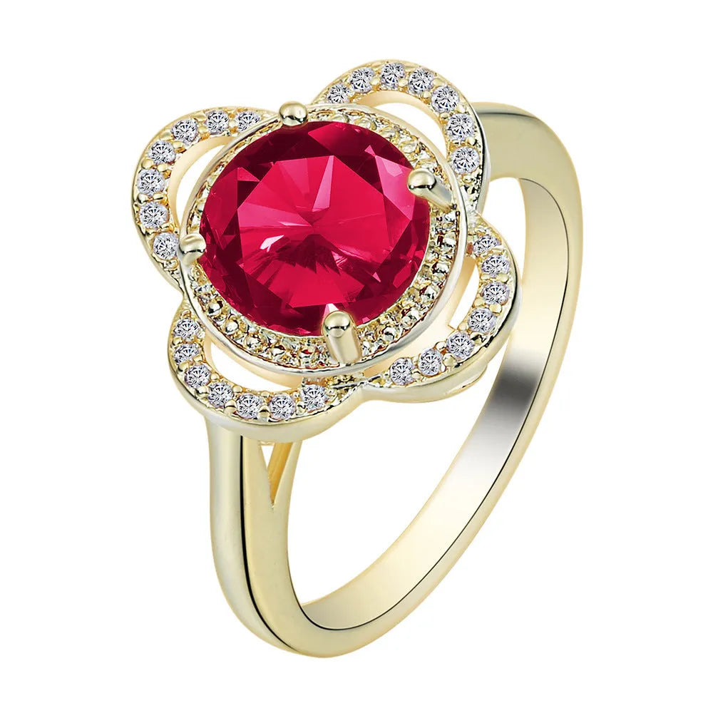 Copper zircon ring with a fruit-shaped design, shown in colour 10-6-1395.