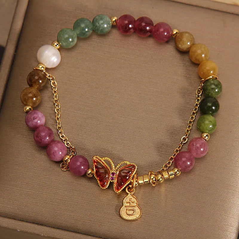 Natural jade coloured agate bracelet with butterfly-gourd tourmaline detail for women.
