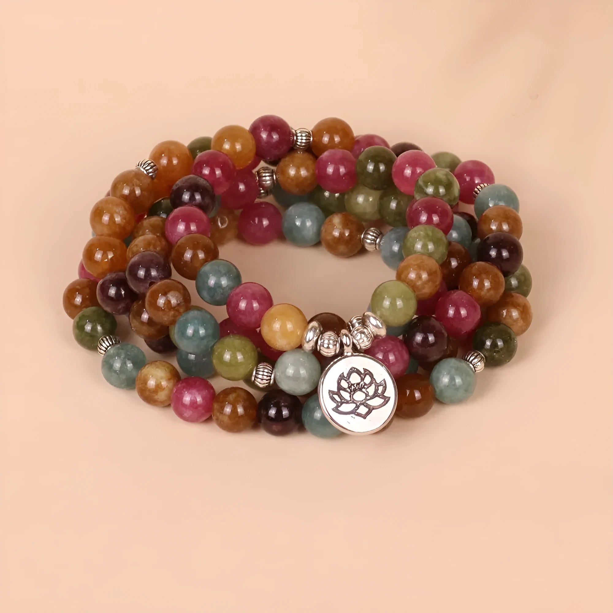 108 bead lotus multi-layer bracelet with tourmaline colour alloy construction and hanging charm