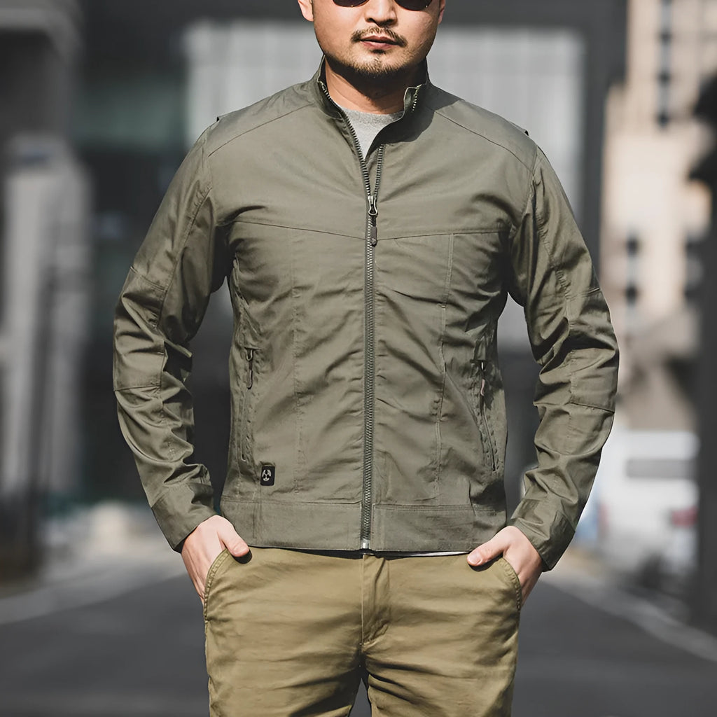 Man wearing a brown tactical camouflage polyester coat with multiple pockets.