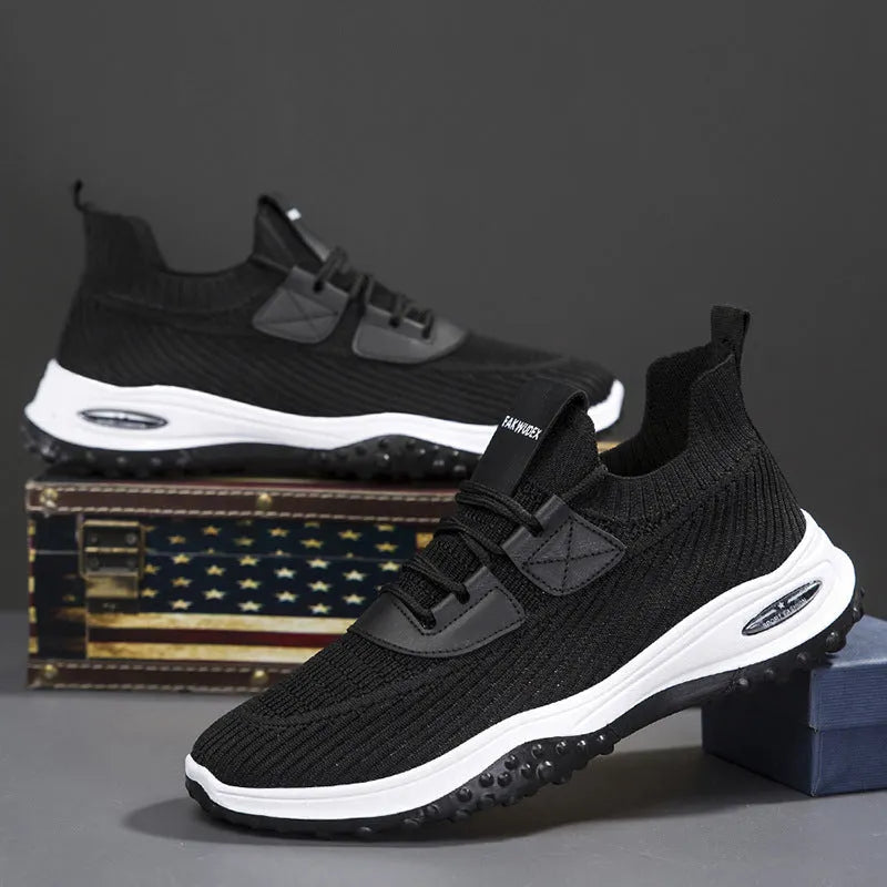 Men's Flyknit low-top running shoes in black with mesh upper and lace-up front.
