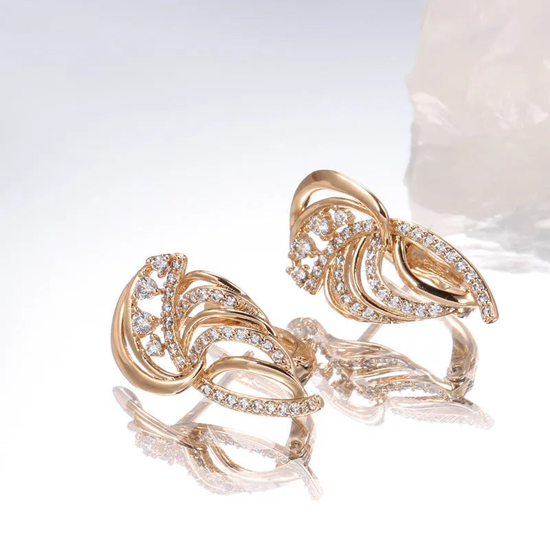 Gold geometric wing ear clips with micro-inlaid zircon stones on U-shaped copper clips