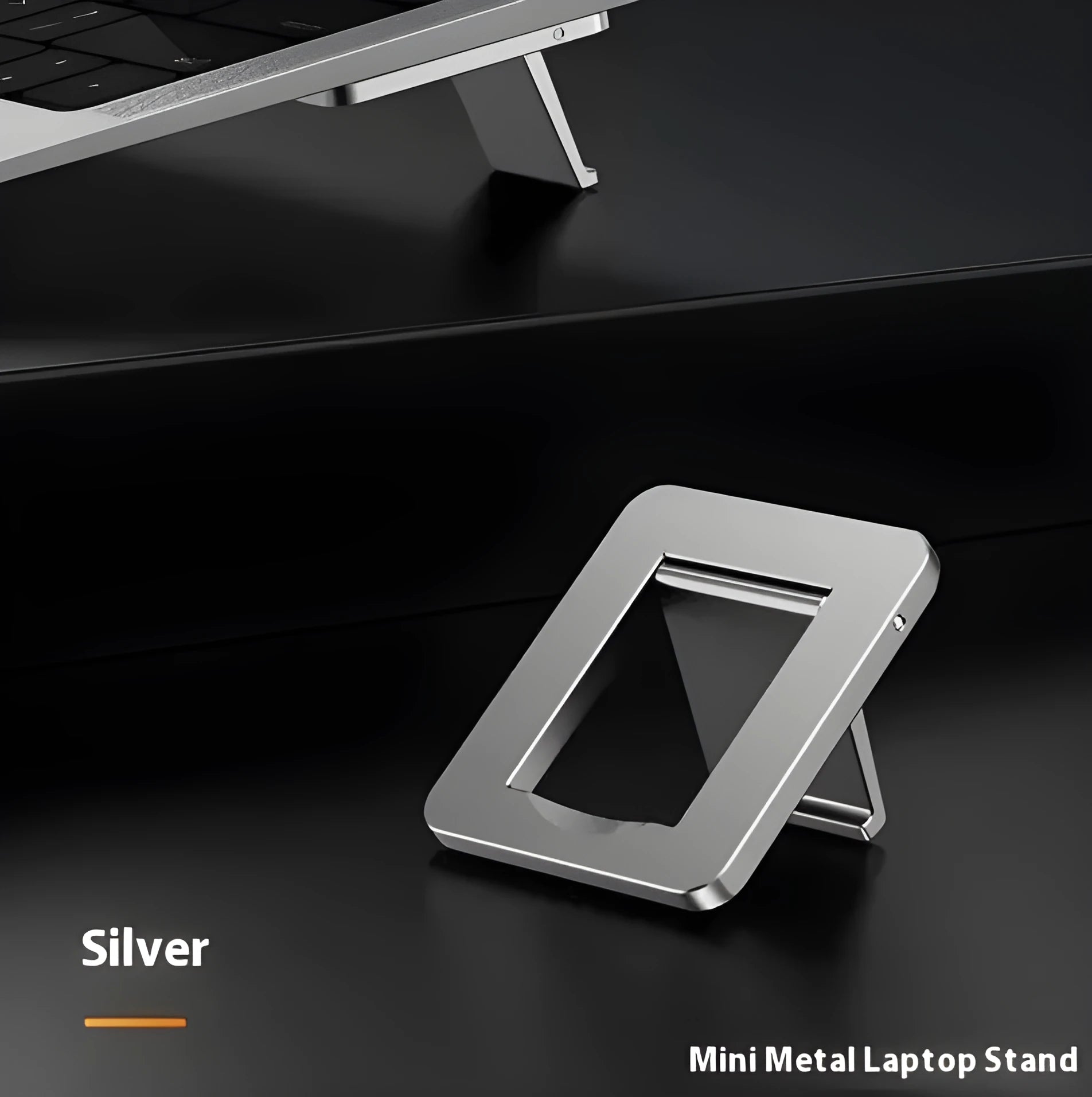 Small silver foldable aluminum laptop stand bracket with 3M adhesive strips on a white background.