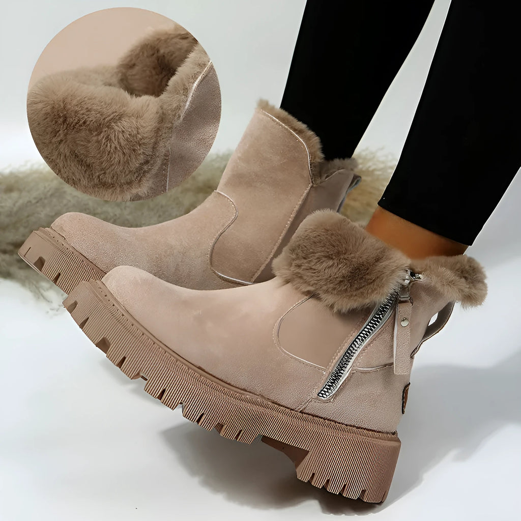 Women's black faux suede high-top snow boots with side zip and thick faux fur lining visible at the ankle.