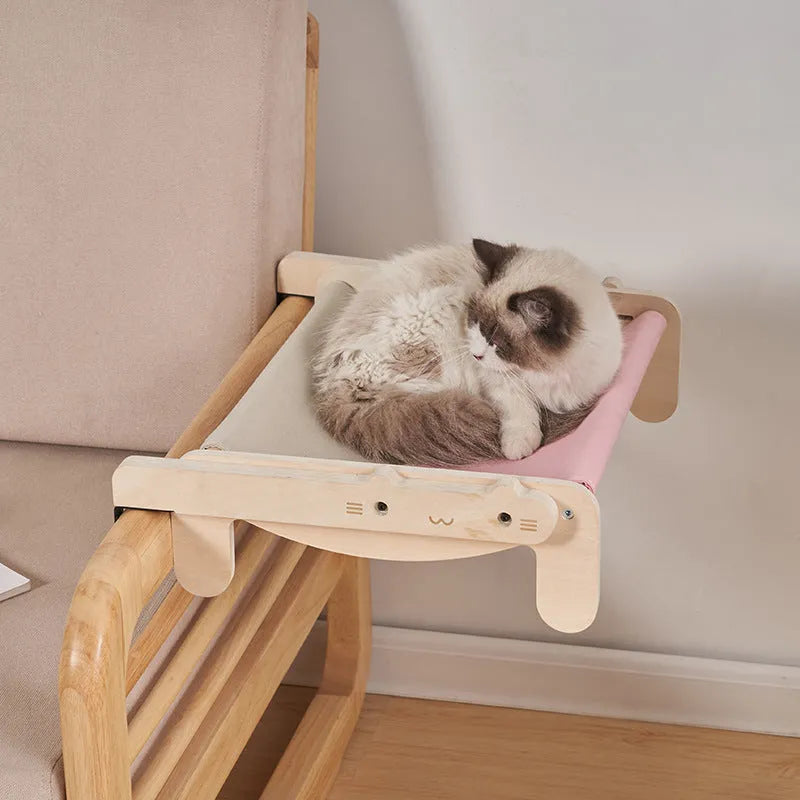 Solid wood cat bed with washable cover in grey-blue colour option on floor