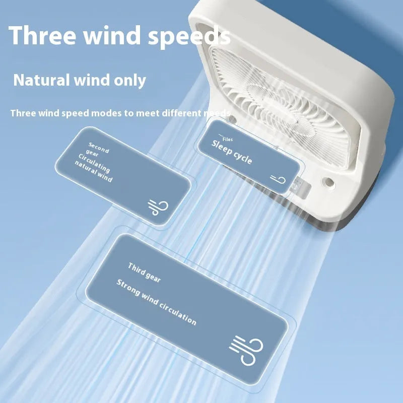 White USB rechargeable air cooler fan with water tank and adjustable head on a table.