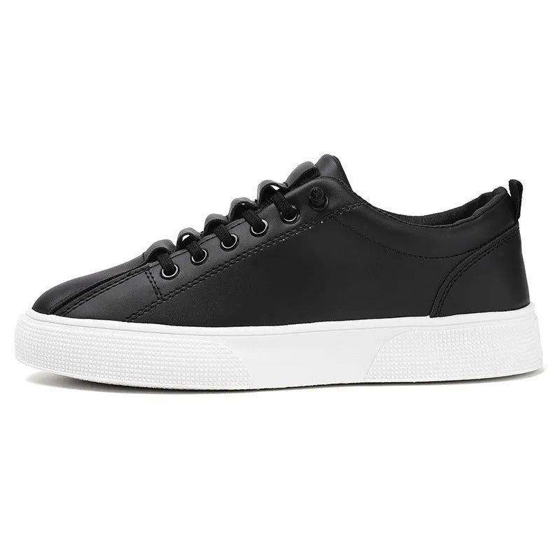 Men's black and white low top sports shoes with mesh panels and synthetic leather upper.