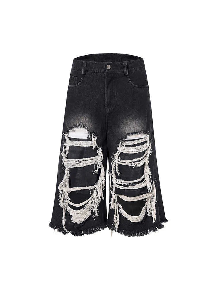 Black women's cropped wide-leg jeans with a mid-high waist and relaxed fit.