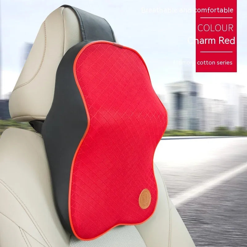 Black and beige memory foam car headrest pillow and lumbar support cushion set on a car seat.