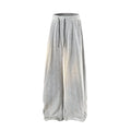 Plus-size fleece-lined straight-leg trousers in light grey on a hanger