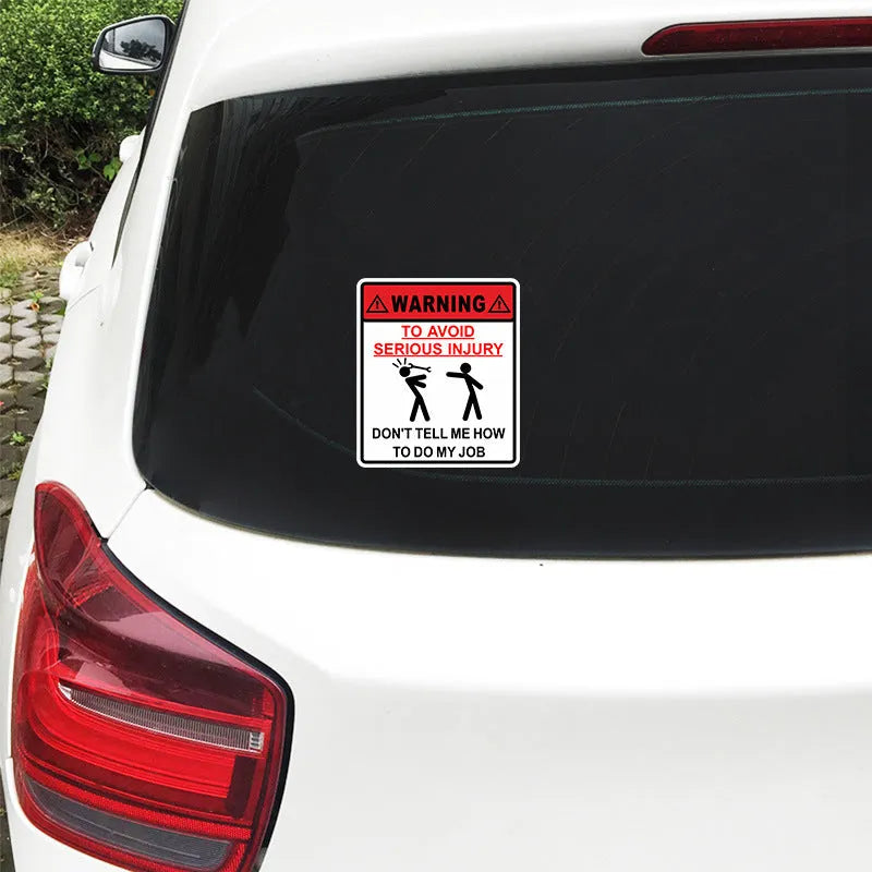 Adhesive car glass warning sticker measuring 14.9cm by 12.6cm.
