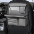 Car seat storage bag with foldable table in leather, hanging behind vehicle seat