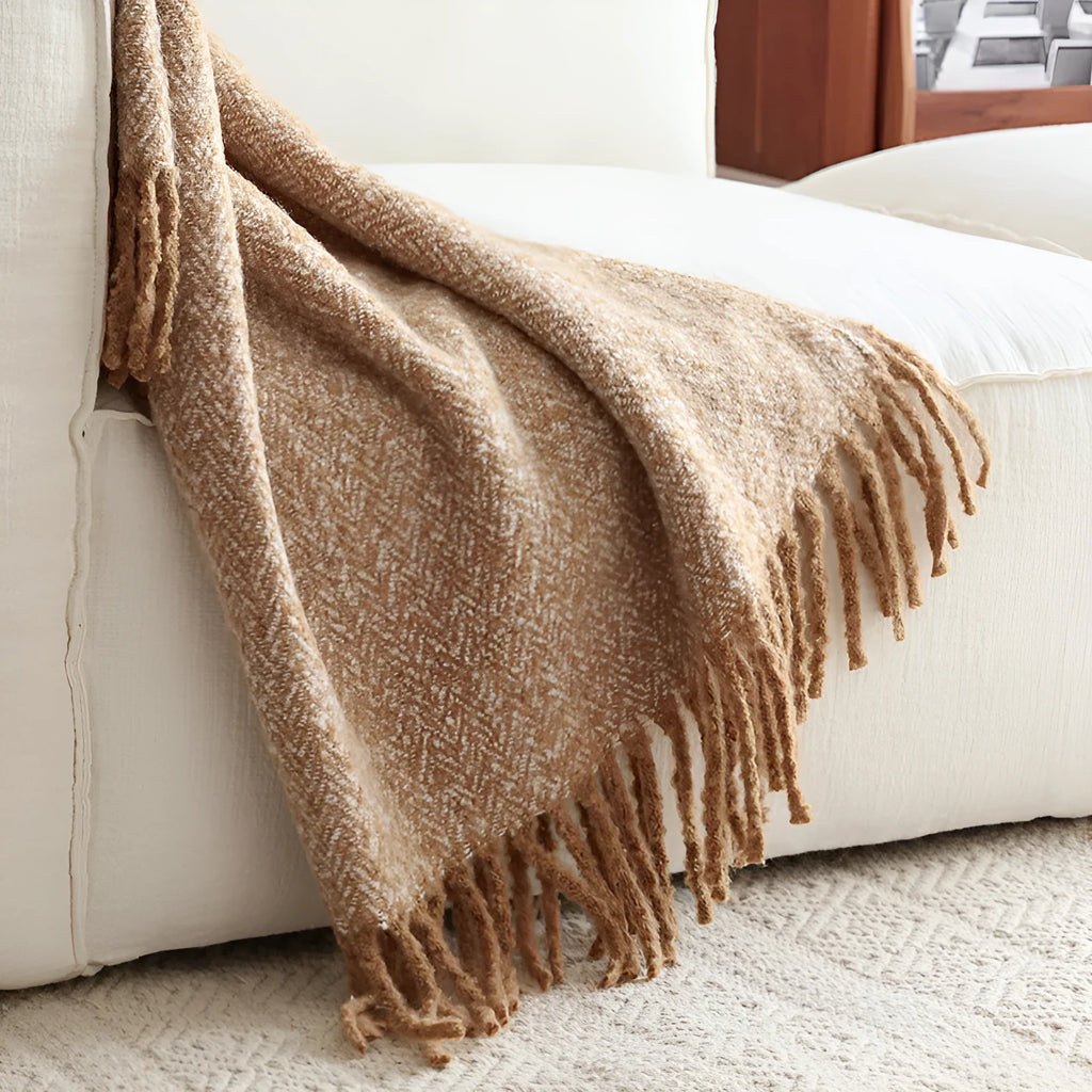 Polyester sofa blanket 120x170cm in khaki folded on a modern sofa