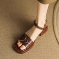 Women's casual leather sandals with thick rubber soles and button fastening in beige colour