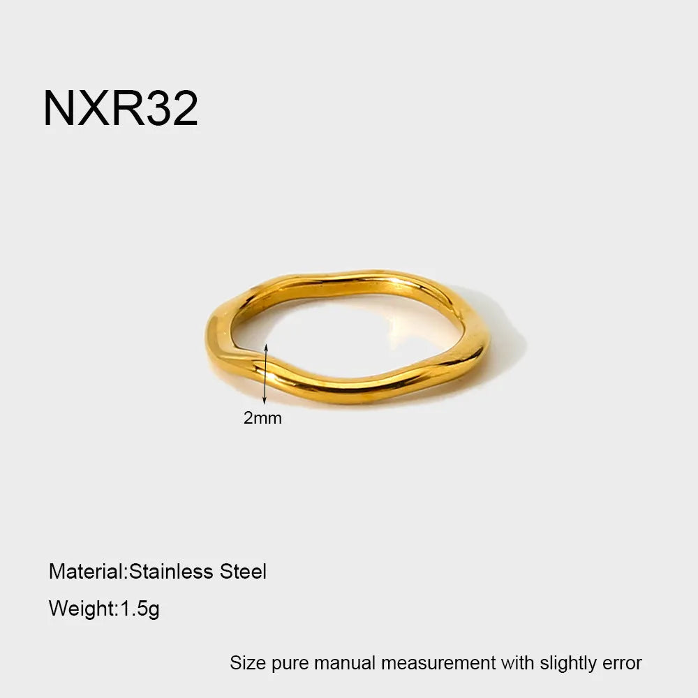 Stainless steel irregular wave ring with electroplated colour finish on hand