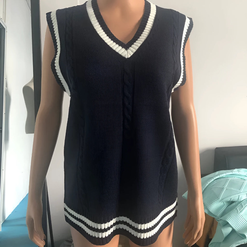 Women's slim fit V-neck acrylic sweater in wine red with striped stitching detail on the front.