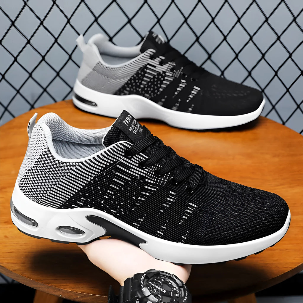 Men's black and gray Flyknit mesh casual sneakers with flat sole and lace-up front